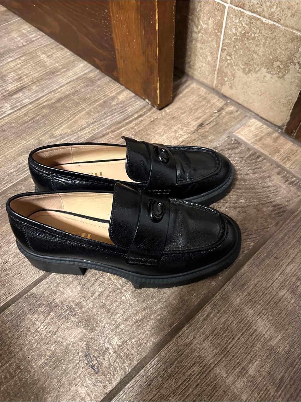 Coach Black Leather women’s Penny Loafers